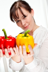 Woman holding peppers
