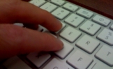 Blogger using a keyboard